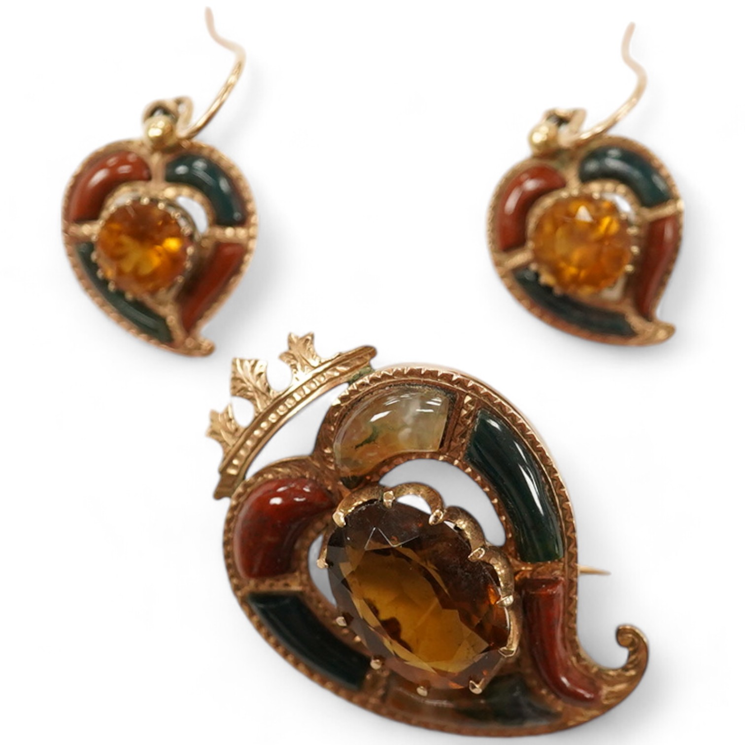 A yellow metal, Scottish hardstone and citrine set suite of jewellery, comprising a brooch, 30mm and pair of earrings, gross weight 7 grams. Condition - fair